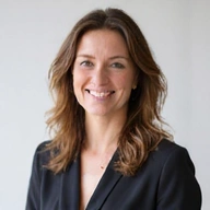Professional headshot of Ms. Isabel Garcia, a business trainer.
